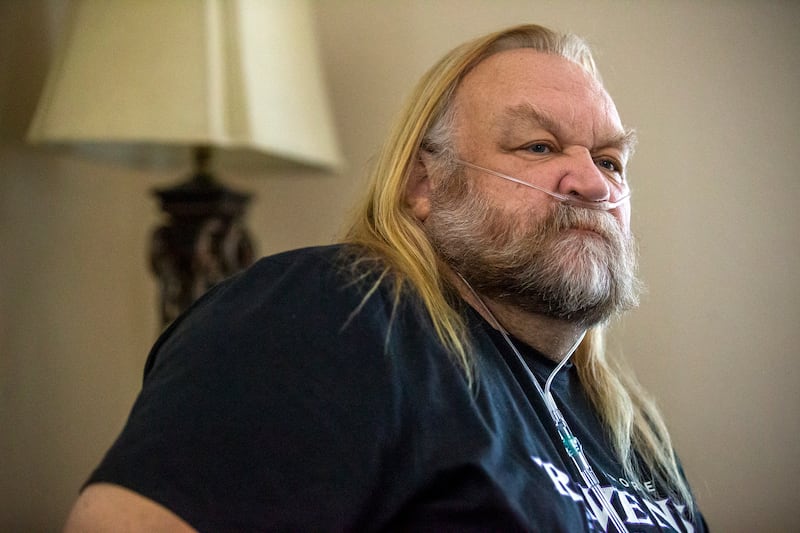 Stan Ellsworth pauses for a moment as he talks about his road to recovery from COVID-19.