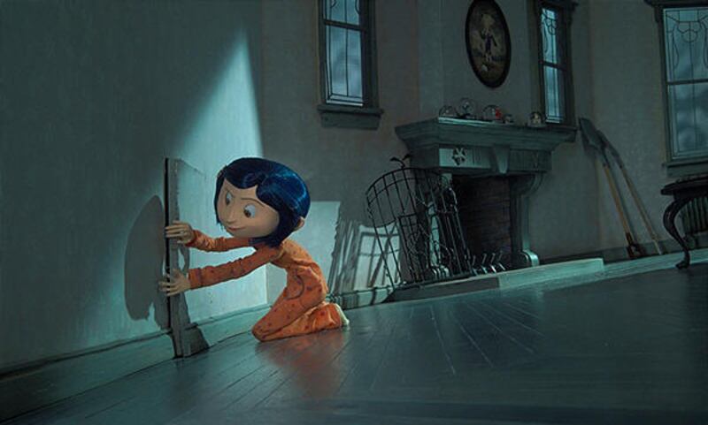 Coraline (voice of Dakota Fanning) is eager to enter the doorway to another world in the stop-motion “Coraline.”