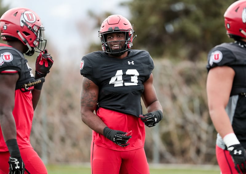 Linebacker Manny Bowen chats with teammates during a University of Utah football practice at the Eccles Football Center in Salt Lake City on Tuesday, March 26, 2019.