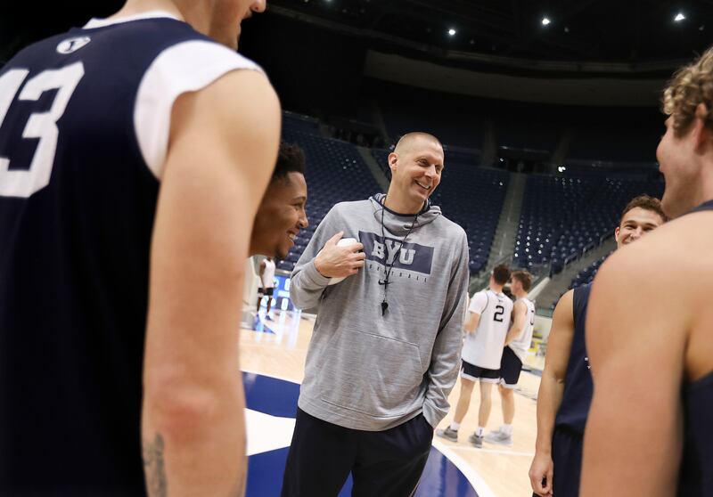 BYU coach Mark Pope speaks with his players during practice at the Marriott Center in Provo on Thursday, Oct. 21, 2021.