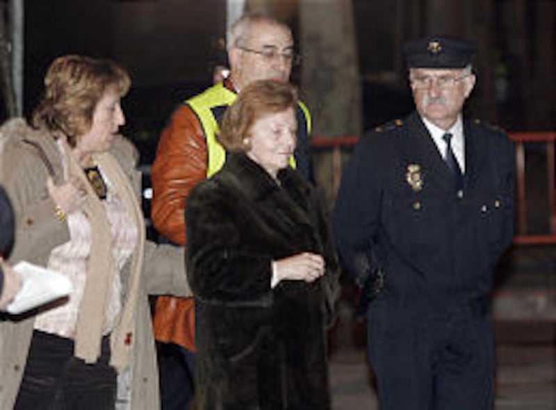 Former Argentine President Isabel Peron, center, arrives at the national court in Madrid on Friday.