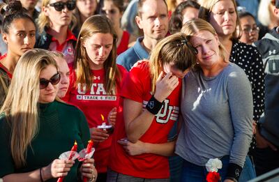 Student-athletes and fellow students gather at the Park Building at the University of Utah in Salt Lake City on Wednesday, Oct. 24, 2018, for a vigil for Lauren McCluskey was killed Monday, Oct. 22, 2018.