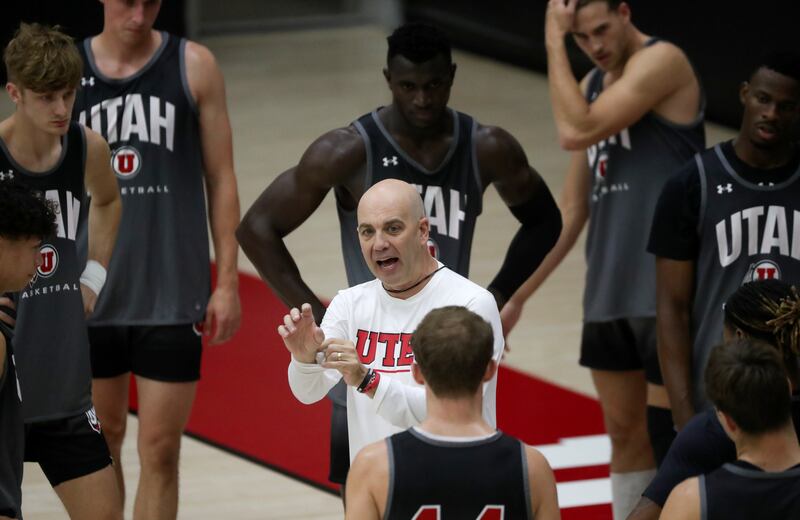Utah head basketball coach Craig Smith talks to players during practice at the Jon M. and Karen Huntsman Basketball Facility.