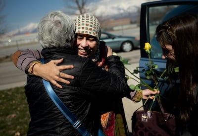 Lufta Samad receives a hug from a community member after a prayer service at Al Sahaba Mosque in Orem on Friday, March 15, 2019. At least 49 people were killed in mass shootings at two mosques in New Zealand on Friday.