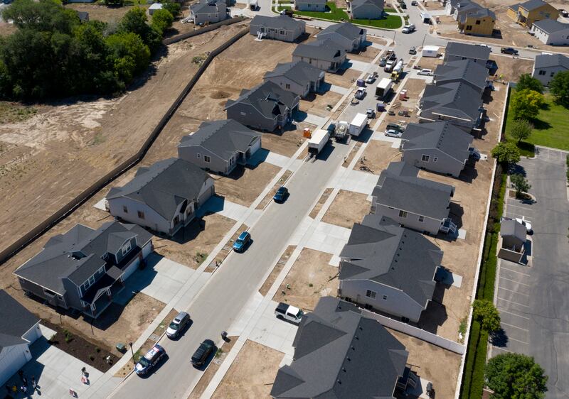 Homes near completion at C.W. Farms, an Ivory Homes development in Magna, on July 29, 2020. The Salt Lake City metro area is the third-most competitive housing market in the nation, according to a July ranking by Redfin, behind only Boston and San Diego. Robert Spendlove, Zions Bank senior economist, and Mike Gould, mortgage division manager for Zions Bancorporation, talked about the current state of and outlook for Utah’s housing market during a press conference at the new subdivision.
