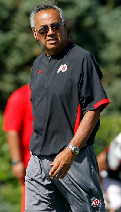 Former Ute offensive coordinator Norm Chow watches the team during drills on Saturday, Aug. 13, 2011.