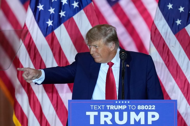 Former President Donald Trump gestures after announcing a third run for president on Nov. 15, 2022, in Palm Beach, Fla.