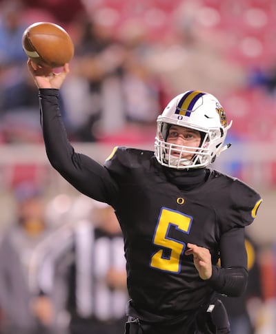 Orem's quarterback Cooper Legas passes the ball to an open Puka Nacua for a touchdown as Orem and Pine View play in 4A semifinal football action at Rice Eccles Stadium at the University of Utah in Salt Lake City on Friday, Nov. 9, 2018. Orem won 62-20.