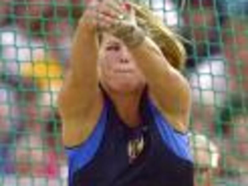 Grantsville's Amy Christensen Palmer throws the hammer during Friday's competition.