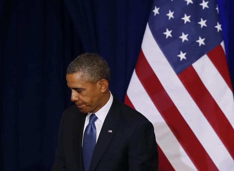 President Barack Obama turns to leave the stage after he spoke about National Security Agency (NSA) surveillance, Friday, Jan. 17, 2014, at the Justice Department in Washington.