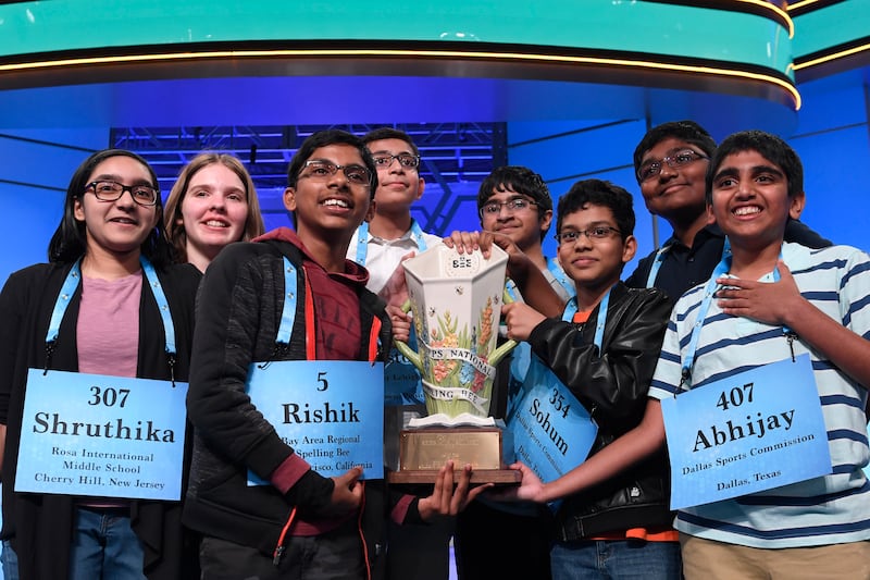 Co-champions of the 2019 Scripps National Spelling Bee, from left, Shruthika Padhy, 13, of Cherry Hill, N.J.; Erin Howard, 14, of Huntsville, Ala.; Rishik Gandhasri, 13, of San Jose, Calif.; Christopher Serrao, 13, of Whitehouse Station, N.J.; Saketh Sund