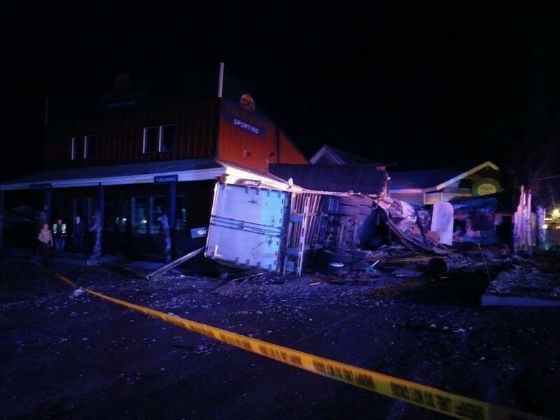 A semitrailer rolled and slid into a store at the intersection of U.S. 89 and state Route 30 on Wednesday, Oct. 10, 2018. Two occupants of the truck were hospitalized in critical condition.