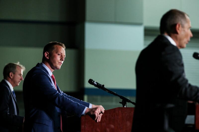 FILE - From left, Chris Herrod, Tanner Ainge and John Curtis appear in the Republican debate for the 3rd Congressional District primary race at the Utah Valley Convention Center in Provo on Friday, July 28, 2017.