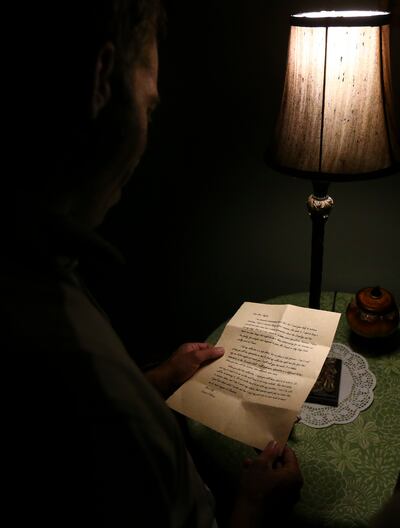 Bryan Hill demonstrates a clue in the new "Downton Abbey" escape room in Mystery Escape Room at The Gateway in Salt Lake City on Friday, July 12, 2019. Mystery Escape Room was approached by NBC Universal International Studios to create the first officiall