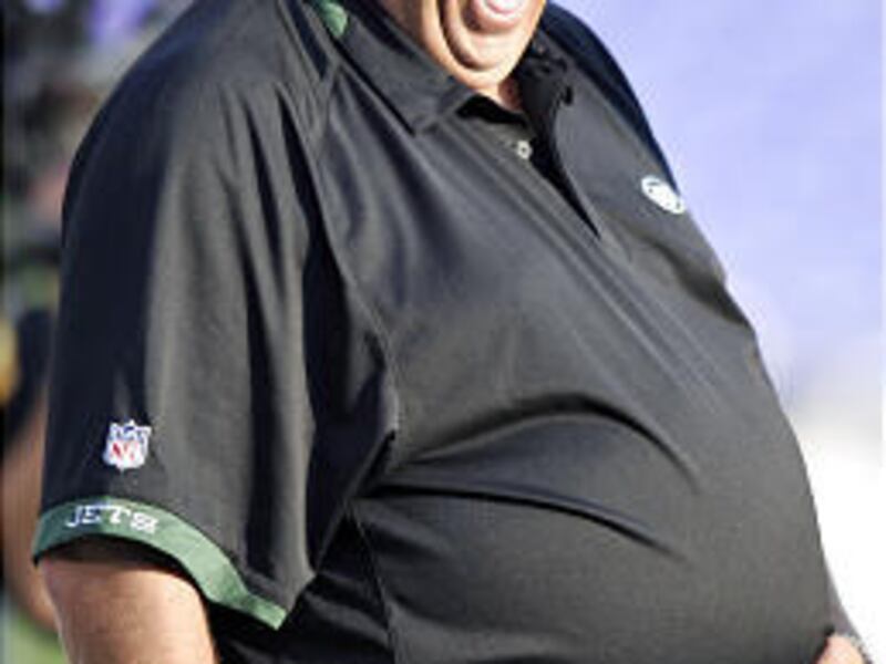 New York Jets head coach Rex Ryan laughs while watching warm ups before a Baltimore Ravens and the New York Jets last month in Baltimore.