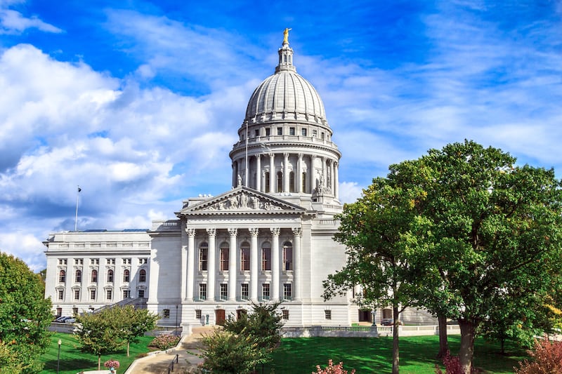 Wisconsin's economic development board approved the key terms of a contract Wednesday implementing a $3 billion incentive package for a Foxconn Technology Group plant in the state, including a personal guarantee from the company's leader to protect state