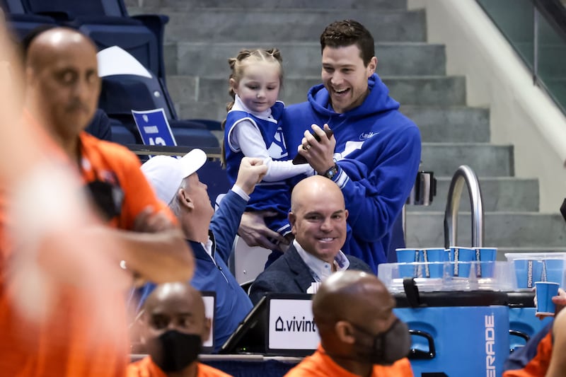 Jimmer Fredette and his 5-year-old daughter Wesley arrive to watch the Brigham Young Cougars play the Pepperdine Waves.