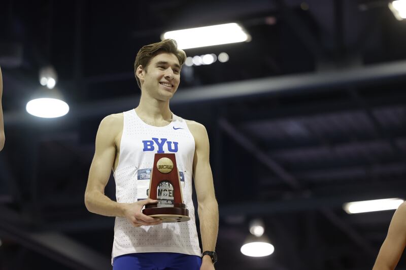 BYU’s Casey Clinger accepts his trophy