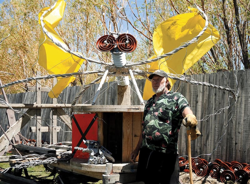 Denis Bame tells a story about the butterfly he crafted from high-voltage transmission lines and other scrap metal.