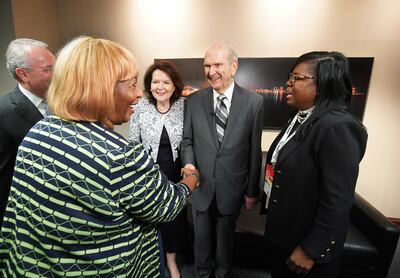 President Russell M. Nelson of The Church of Jesus Christ of Latter-day Saints and his wife, Sister Wendy Nelson, meet with the Rev. Theresa Dear, right, and others at the 110th NAACP convention in Detroit on Sunday, July 21, 2019.