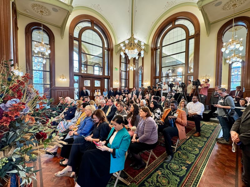 People listen at the media event Tuesday, Sept. 1, 2026, in Salt Lake City announcing the theme "Rejoice in Christ" for The Church of Jesus Christ of Latter-day Saints' upcoming open house and celebration of the historic Salt Lake Temple.