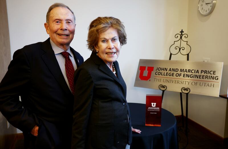 Former U.S. Ambassador John Price and his wife Marcia Price pose for a photo during a small reception following the ceremony where the College of Engineering at The University of Utah was renamed the John and Marcia Price College of Engineering in Salt Lake City on Tuesday.