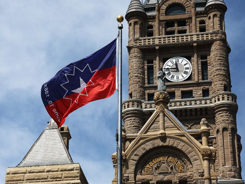 The Juneteenth flag flies at the Salt Lake City-County Building.