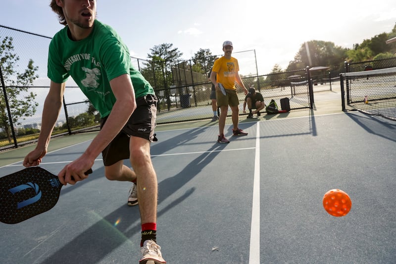 Rowan Warren, left, plays pickleball at the 11th Avenue Park in Salt Lake City on Thursday, June 30, 2022.