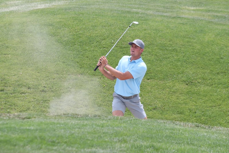 BYU golfer Max Brenchley hits a drive