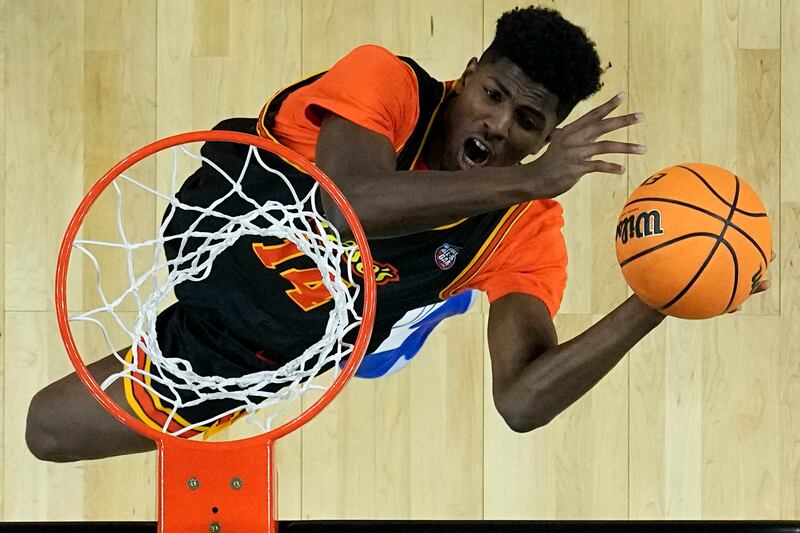 Jeenathan Williams, of Buffalo, scores during the first NCAA All Star college basketball game, April 1, 2022, in New Orleans.