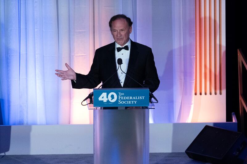 Supreme Court Justice Samuel Alito speaks during a Federalist Society party in Washington, Monday, Nov. 10, 2022