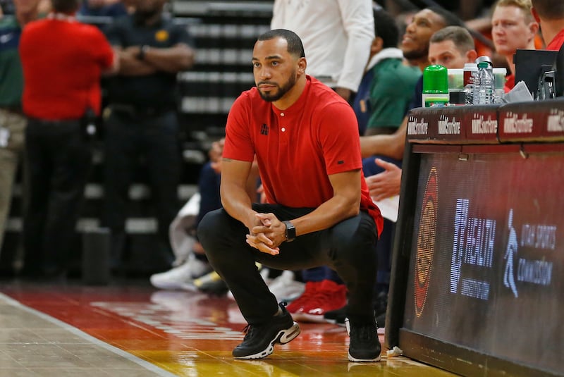 Utah Jazz coach Lamar Skeeter watches during the first half of the team's NBA summer league basketball game against the San Antonio Spurs on Wednesday, July 3, 2019, in Salt Lake City.