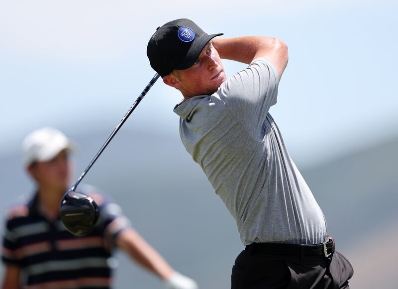 Zac Jones tees off as he and Simon Kwon play in match play for the 124th Utah State Amateur Championship.