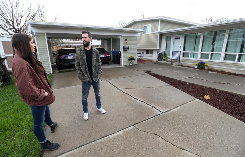 Jade and Taylor Dipo at their Taylorsville, Utah, home on Tuesday, April 16, 2019. The Dipos are in their mid-20s and bought their home just over a year ago. Some say they're bucking a national trend, which has millennials not buying homes until they're m