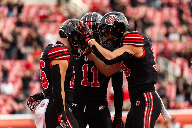 Utah Utes players celebrate Utah Utes running back Charlie Vincent’s touchdown during the game against the Arizona State Sun Devils at Rice-Eccles Stadium in Salt Lake City on Saturday, Nov. 4, 2023.