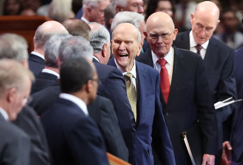 President Russell M. Nelson smiles upon greeting fellow leaders before the Sunday afternoon session of the 193rd Annual General Conference of The Church of Jesus Christ of Latter-day Saints in Salt Lake City.