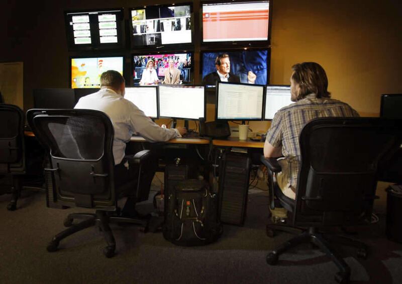 Network Operations Center Technicians work in the NOC, Network Operations Center at Utopia, a fiber optic company Thursday, Oct. 20, 2011.