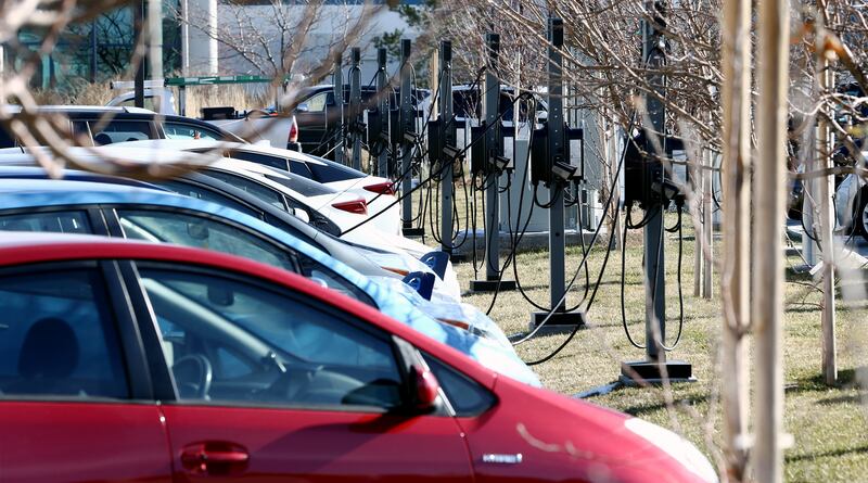 Electric cars are parked at charging stations as Packsize International in Salt Lake City becomes the largest electric vehicle charger installation in Utah on Tuesday, Dec. 19, 2017.