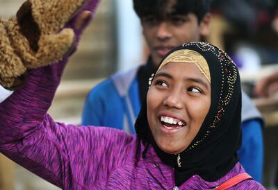Shahima Begum is all smiles while picking up gifts during the Salvation Army’s Angel Tree program in Salt Lake City on Friday, Dec. 21, 2018. Through the ongoing partnership between the Salt Lake Education Foundation and The Salvation Army, 1,469 school s