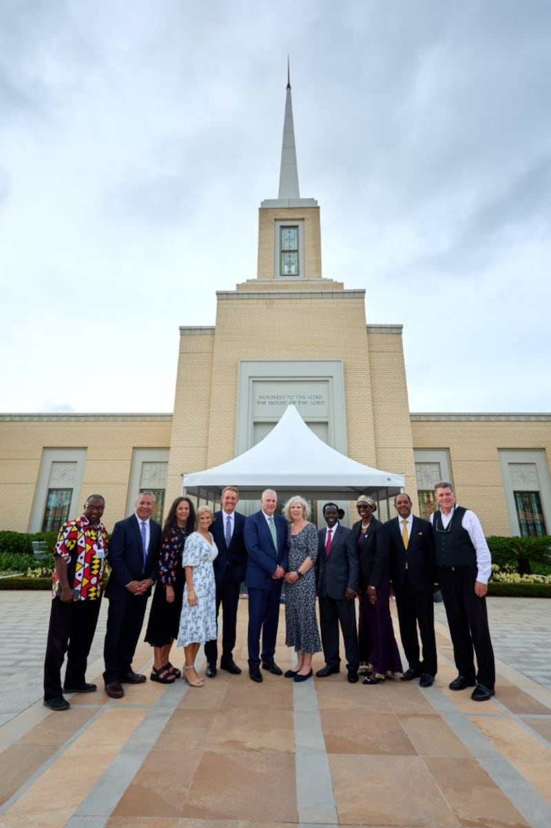 General Authority Seventy Elder Erich W. Kopischke and Elder Vaiangina Sikahema, second counselor in the Africa South Area presidency, pause for a photo with religious leaders outside the Harare Zimbabwe Temple.