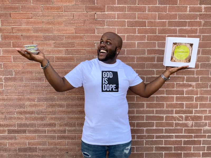 James Edwards holds up some of his signature gourmet sweet potato pies.