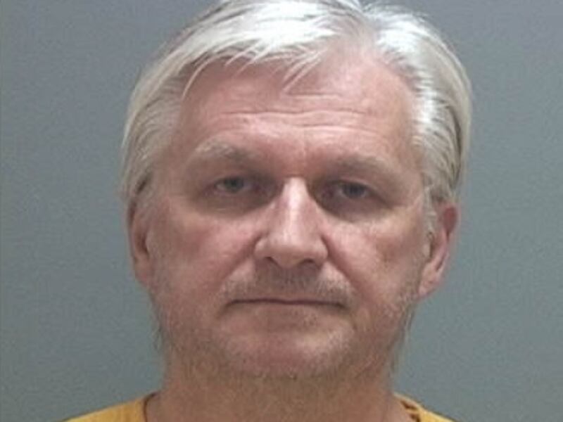 Ron Rockwell Hansen, of Syracuse, faces federal charges for allegedly selling classified national defense information to China.