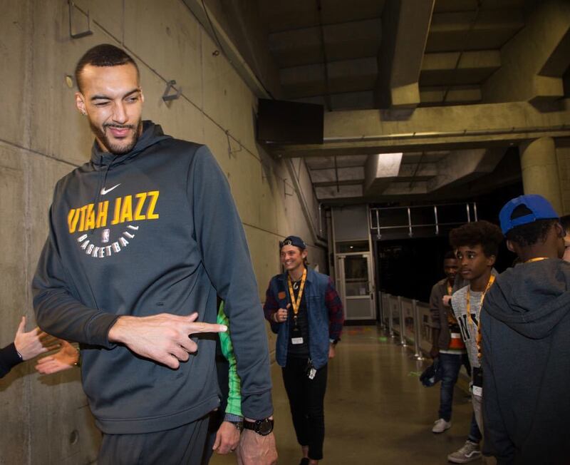 Utah Jazz center Rudy Gobert meets and has some fun with some of the inner-city refugee youth that he sponsored to come to a Jazz game this season through his Rudy's Kids Foundation.