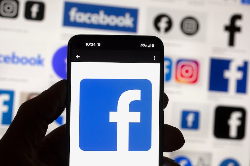 The Facebook logo is seen on a cellphone on Oct. 14, 2022, in Boston.