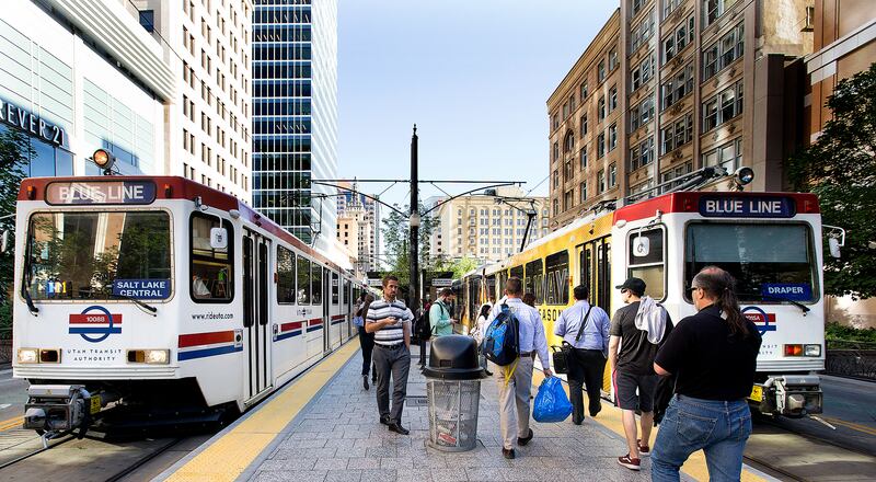 FILEPeople exit and board TRAX trains in Salt Lake City on Tuesday, June 12, 2018. The Salt Lake City Council is discussing a resolution to support the revival of Proposition 1 in Salt Lake County to pay for transportation projects.