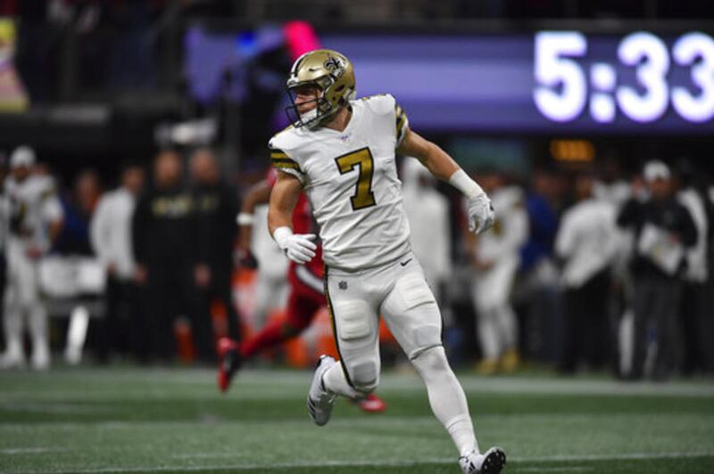 New Orleans Saints quarterback Taysom Hill (7) works during special teams against the Atlanta Falcons during the first half of an NFL football game, Thursday, Dec. 7, 2017, in Atlanta. (AP Photo/Danny Karnik)