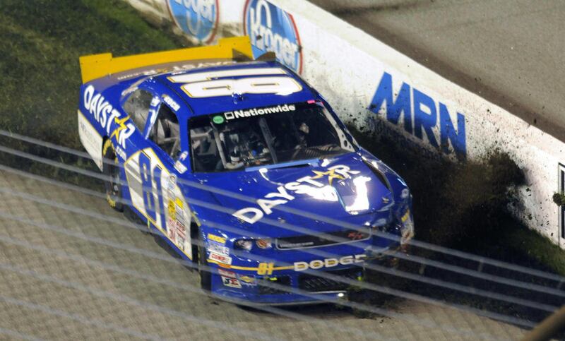 Blake Koch (81) bounces off the wall in Turn 1 during the NASCAR Nationwide auto race at Richmond International Raceway in Richmond, Va., Friday Sept. 9, 2011.