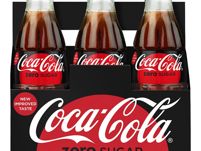 This photo provided by Coca-Cola shows a six-pack of bottled Coca-Cola Zero Sugar. Coke Zero is getting a makeover as Coke Zero Sugar in the United States. The new cans and bottles, which will incorporate more red like regular Coke, will start hitting she