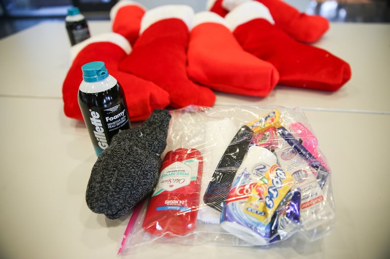 The contents of Christmas stockings donated by the Utah Board of Education and distributed to clients at the VOA Youth Resource Center in Salt Lake City is pictured on Tuesday, Dec. 19, 2017.