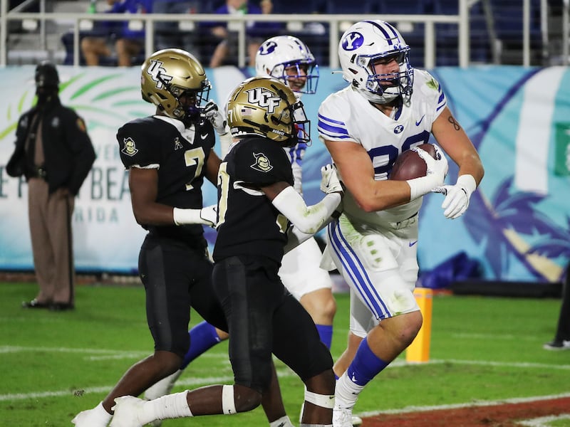 BYU tight end Isaac Rex catches a touchdown pass during the Cougars’ win over UCF in the 2020 Boca Raton Bowl.